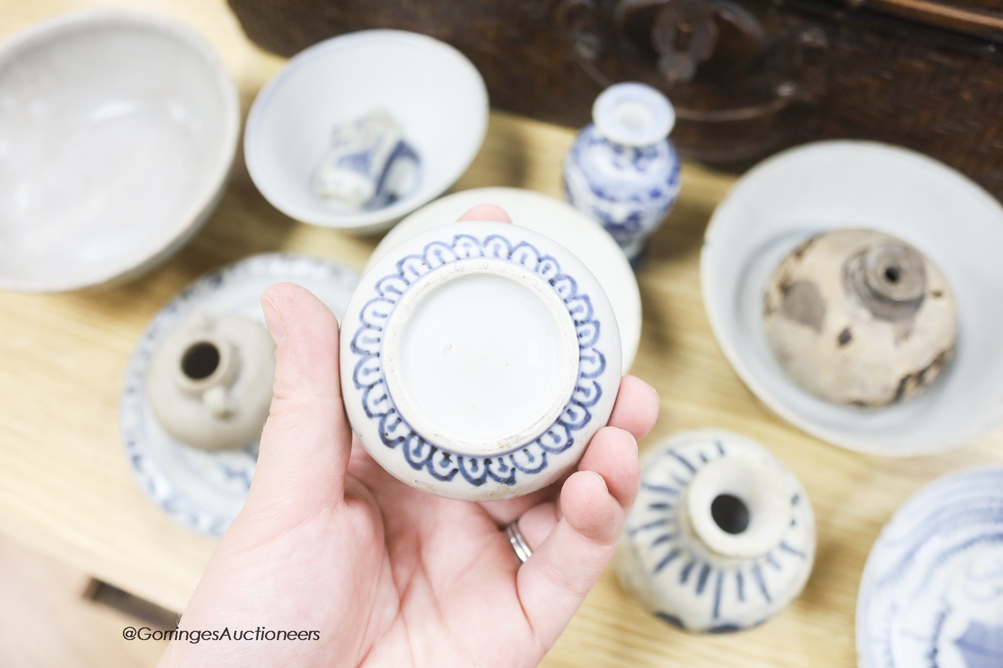 A collection of Chinese and Annamese shipwreck ceramics, Song to 19th century including bowls and vases, together with two graduated wicker baskets